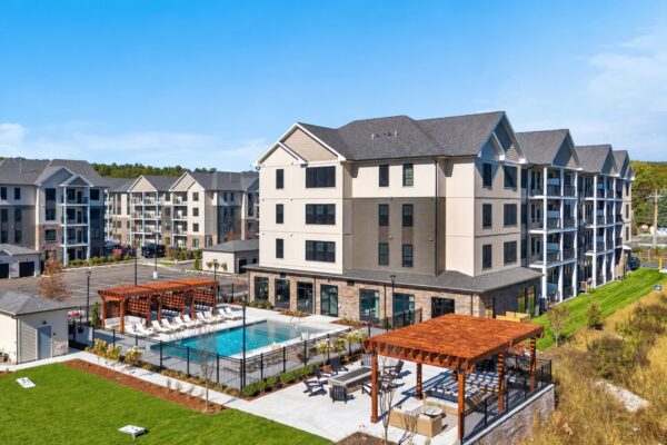Aerial of the pool and outdoor patio area with fire pits